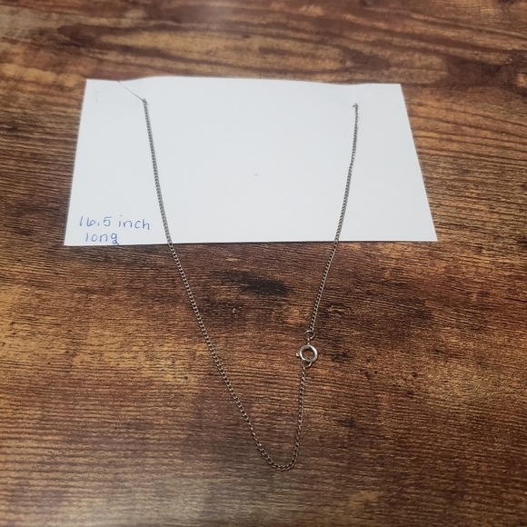 silver tone necklace with cream elephant pendant - Picture 3 of 5